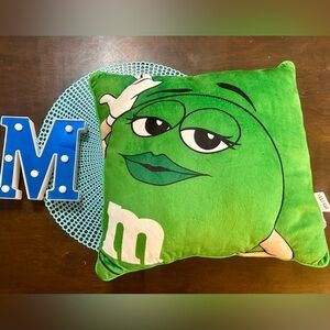 Green M&M Character Pillow, 14"x14" "You May Call Me Queen Bee", used